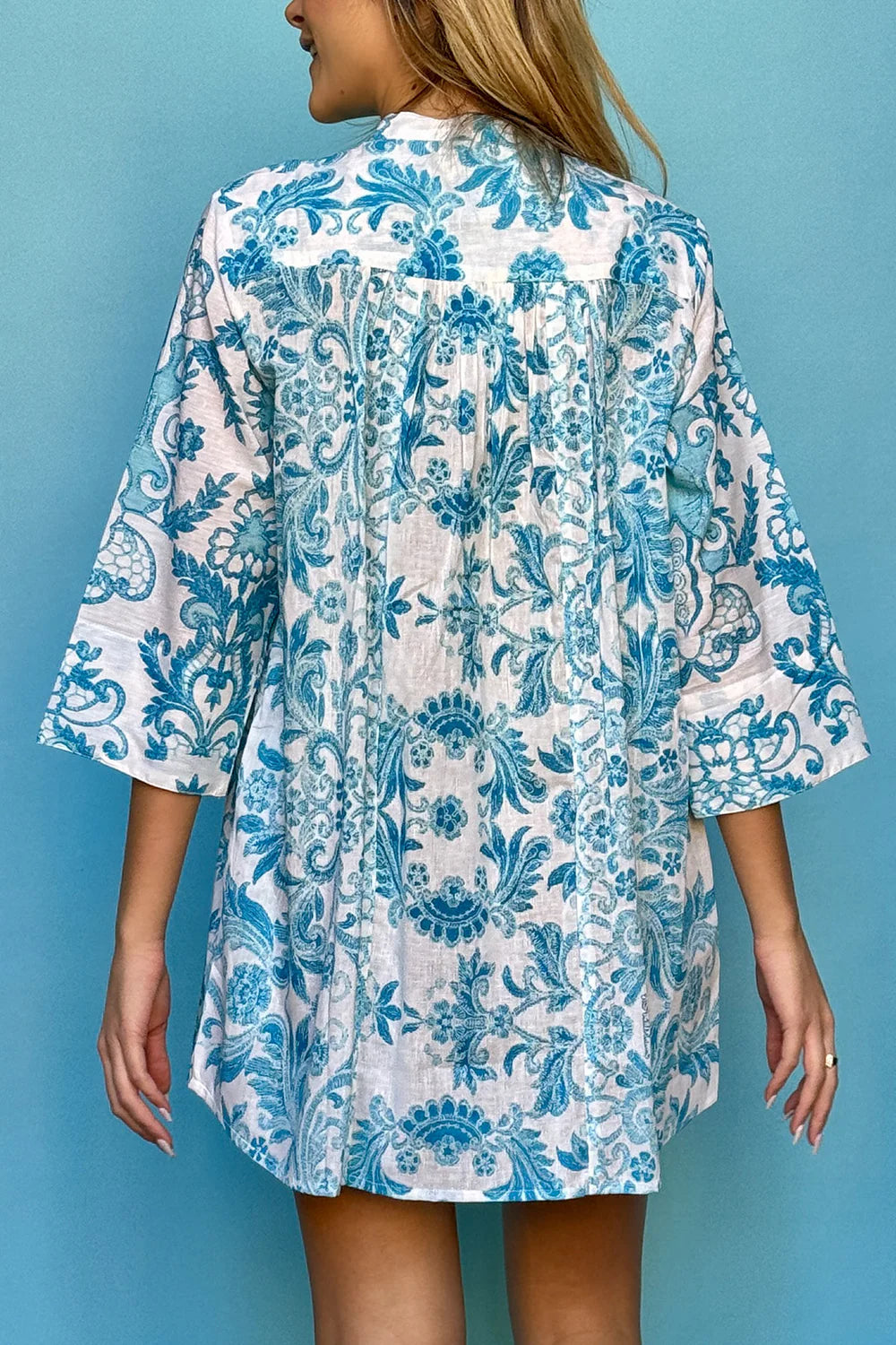 Dress open at the front
